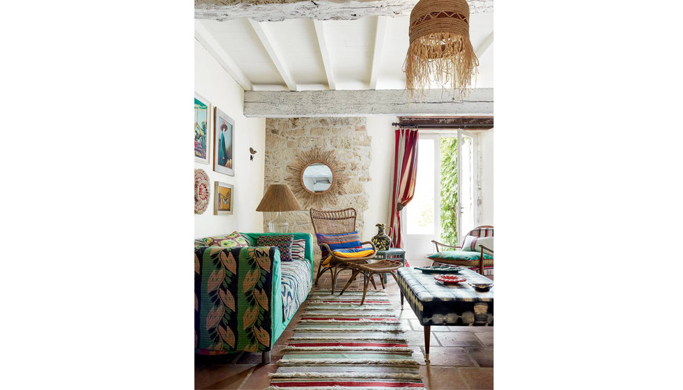 Provence interiors - a rustic farmhouse in France fit with colourful furnishings.