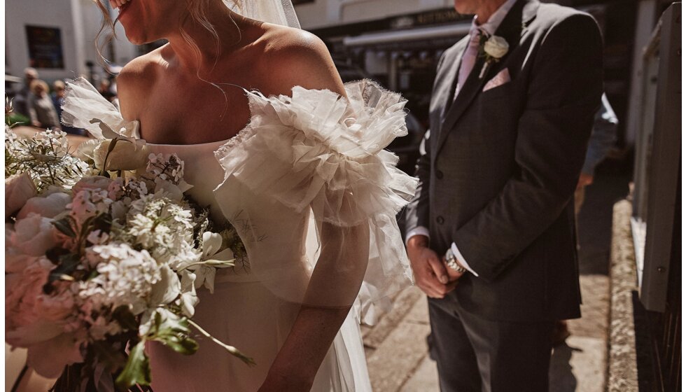 Jessica & Jack’s Idyllic Seaside Wedding in Cornwall: Bride arrives to church