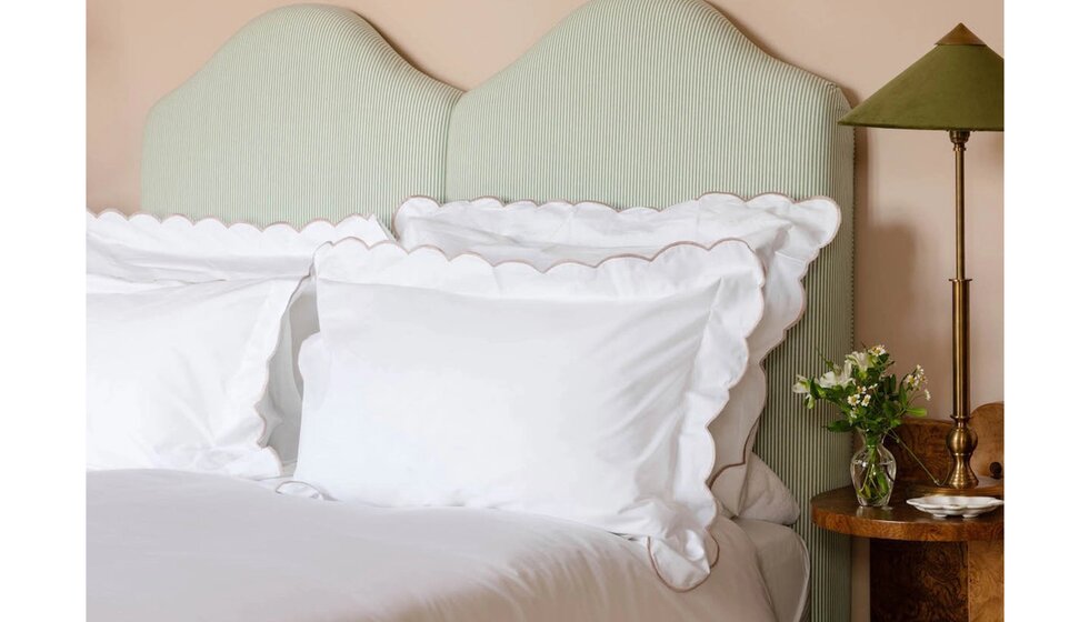 Special Wedding Gift List Ideas for the Bedroom | Green and White Striped Bed with Scalloped-Designed White Bedding and Flower in Vase