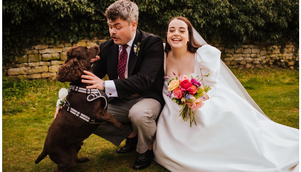 The Wedding Present Company | Bride and groom with their dogs on their spring flower-filled wedding in Cambridgeshire