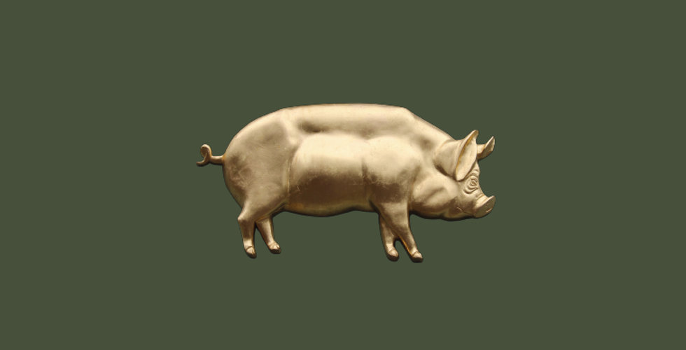 The Pig Hotel logo on a green background.